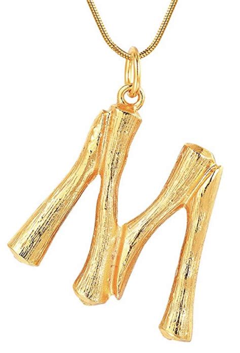 celine gold necklace letter|Celine initial necklace.